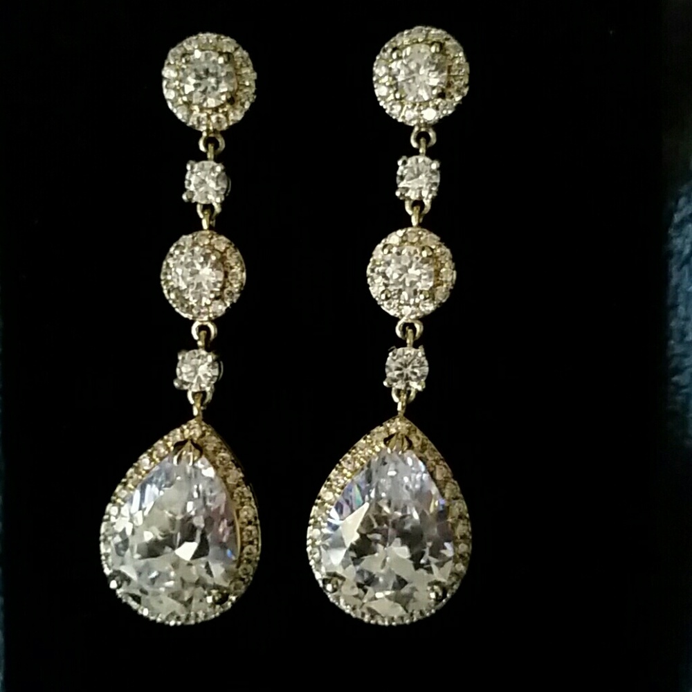 Stunning CZ earrings overlay in 14kt gold.
